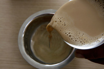 Filter coffee being poured into a dabarah 