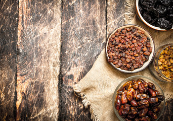 Different dried fruit in bowls.