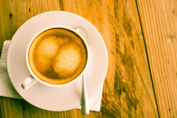 Cup of coffee on background