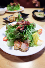 Vegetable salad with corn and bacon