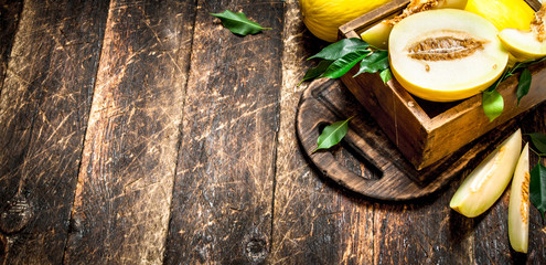 Sliced fresh melon in the old box.