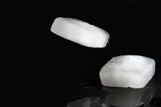 An ice cube is a small, roughly cube-shaped piece of ice, conventionally used to cool beverages