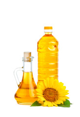 Beautiful sunflowers and sunflower oil on a white background.