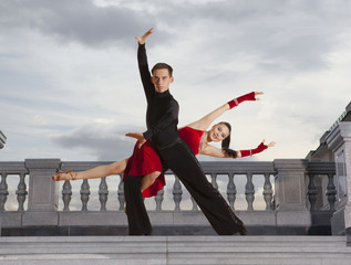 Pair of dancers dancing ballroom