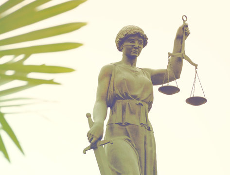 the statue of goddess of justice Themis close-up