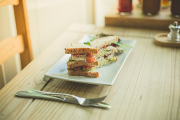 Plate with sandwich in cafe