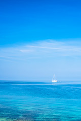 Sailing boat on the peaceful Adriatic Sea near the Croatian coast, Europe.