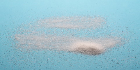 Salt isolated on blue background