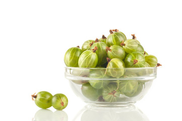 Gooseberry smoothie in a jar on a white table. Isolated