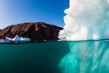 Underwater view of icebergs in Scores Bysund Fjord, east Greenland.