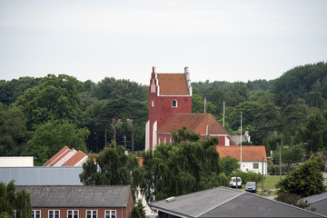Fototapeta na wymiar Byrum skyline with red church