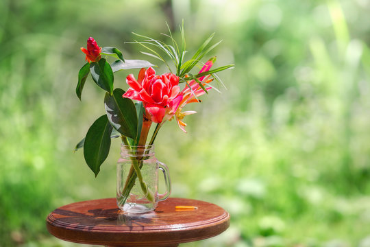 Bouquet Of Exotic Tropical Flowers In The Glass Vase.