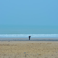 Fototapeta na wymiar alone on the beach