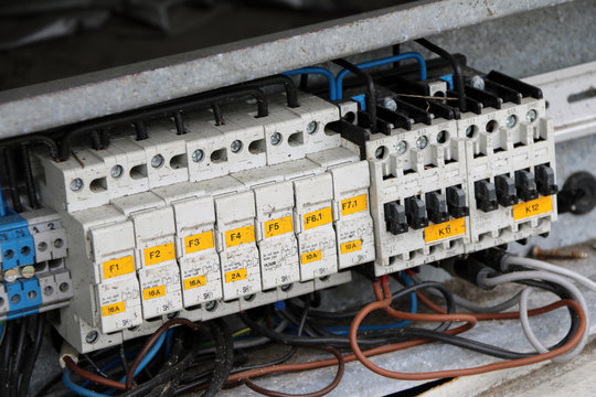 Old electric switch cut out, a device that automatically breaks an electric circuit for safety. 