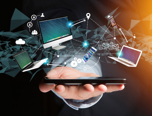 Computer and devices displayed on a futuristic interface with interantional network - Multimedia and technology concept