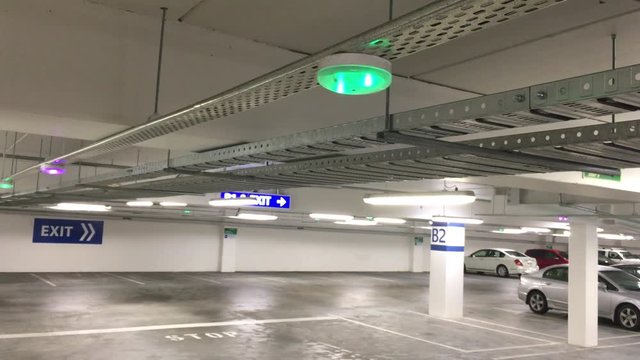 Car Parking lot sensors on ceiling, Indicator Light show Parking space unoccupied is green