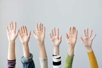 Group of hands raised