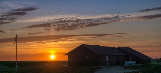 Holiday house in the sunset