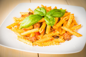 Ziti, Italian pasta with sausage and tomato sauce