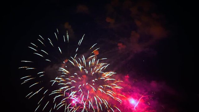 4K Slow Motion Beautiful Fireworks Display Celebration, Bright Purple and Pink