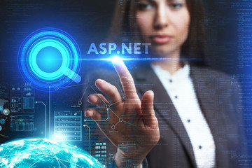 The concept of business, technology, the Internet and the network. A young entrepreneur working on a virtual screen of the future and sees the inscription: ASP.NET