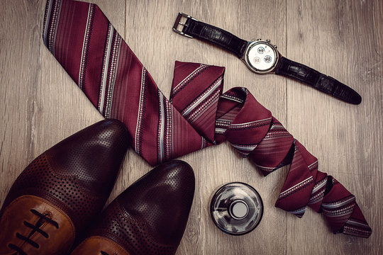 male accessories. Shoes with perfume and tie