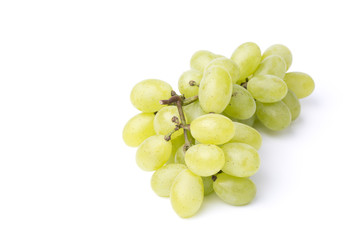 Bunch of green grapes on white background.