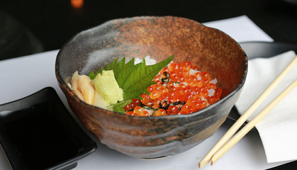 Japanese food, Japanese Steamed Rice Topping with Red salmon caviar served with Wasabi, Salmon roe bowl.