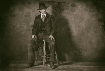 Fototapeta na wymiar Wet plate style photo of vintage western mature man 