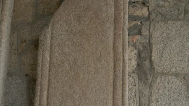 stones with inscriptions at the entrance to a church of the seventeenth century
