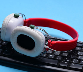 Electronic appliances isolated on cyan background. Sound recording and technology