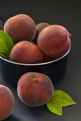 peaches lie in a pot