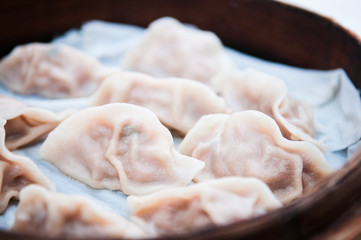 Fototapeta na wymiar Xiaolongbao, soup dumplings, Xiao long bao, Chinese Dim Sum