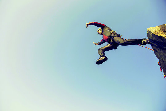 Jump off a cliff into a canyon with a rope.