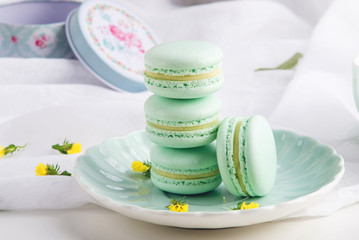 Turquoise mint macarons. French delicate dessert for Breakfast