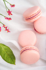 Pink strawberry macarons. French delicate dessert for Breakfast