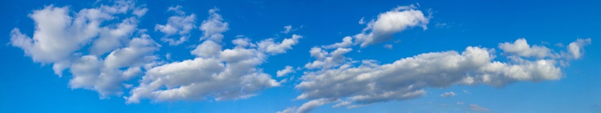 Blue sunny sky with white clouds landscape banner, huge panorama © rustamank