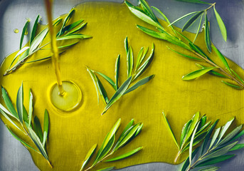 Olive oil with olive twig