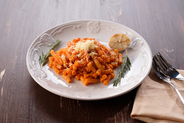 Italian pasta with tomato cheese and garlic