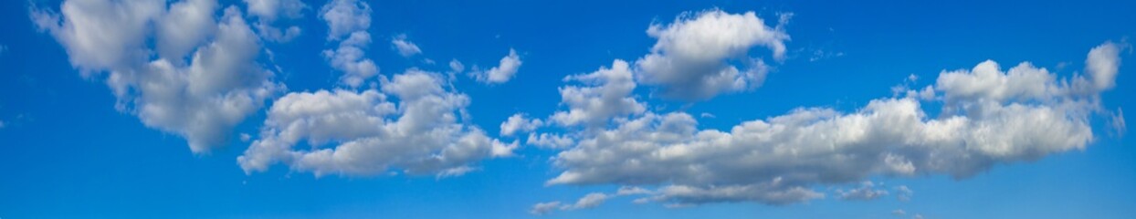 Naklejka na ściany i meble Blue sunny sky with white clouds landscape banner, huge panorama
