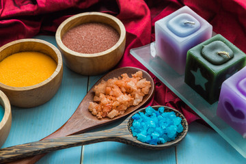 spa and massge items lay on blue wooden background