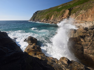 Fototapeta na wymiar Breaking wave Porth Nanven Cornwall