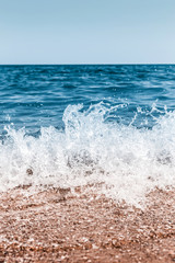 Sea view from tropical beach with sunny sky. Sea travel and holiday. Selective focus