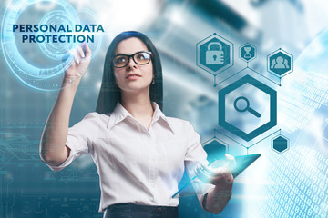 The concept of business, technology, the Internet and the network. A young entrepreneur working on a virtual screen of the future and sees the inscription: Personal data protection
