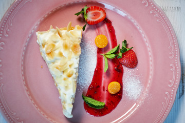 Tiramisu dessert on wooden table. Top view with copy space jpg