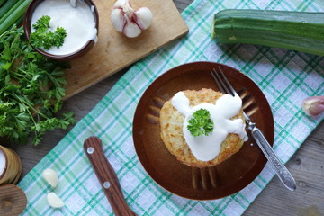 Fritters of zucchini. Zucchini Pancakes