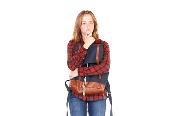 Studio portrait of red-haired female college student with backpack