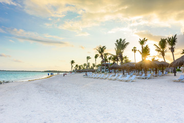Fototapeta na wymiar Beautiful white sand beach in Akumal, Mexico - paradise bay Beach in Quintana Roo - caribbean coast - late afternoon and sunset at Riviera Maya