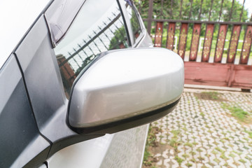 Obraz na płótnie Canvas Silver wing mirror car.