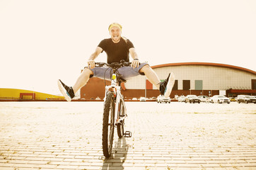 The guy on the bike is having fun. Toning.